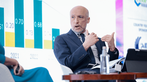 Delegates discussing market trends at the Shanghai battery event