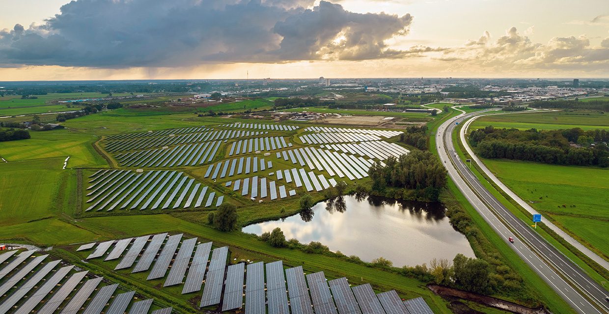 Solar panels next to a motorway in the Netherlands.