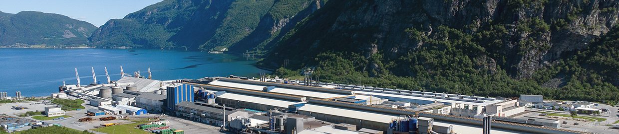 Aerial view of the Hydro Norse aluminium production facility set in the beautiful landscape of Norway.
