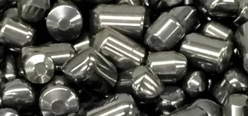 close-up of tungsten pellets - hero image for tungsten prices