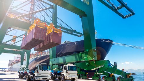 Crane unloading two containers at Rio de Janeiro port